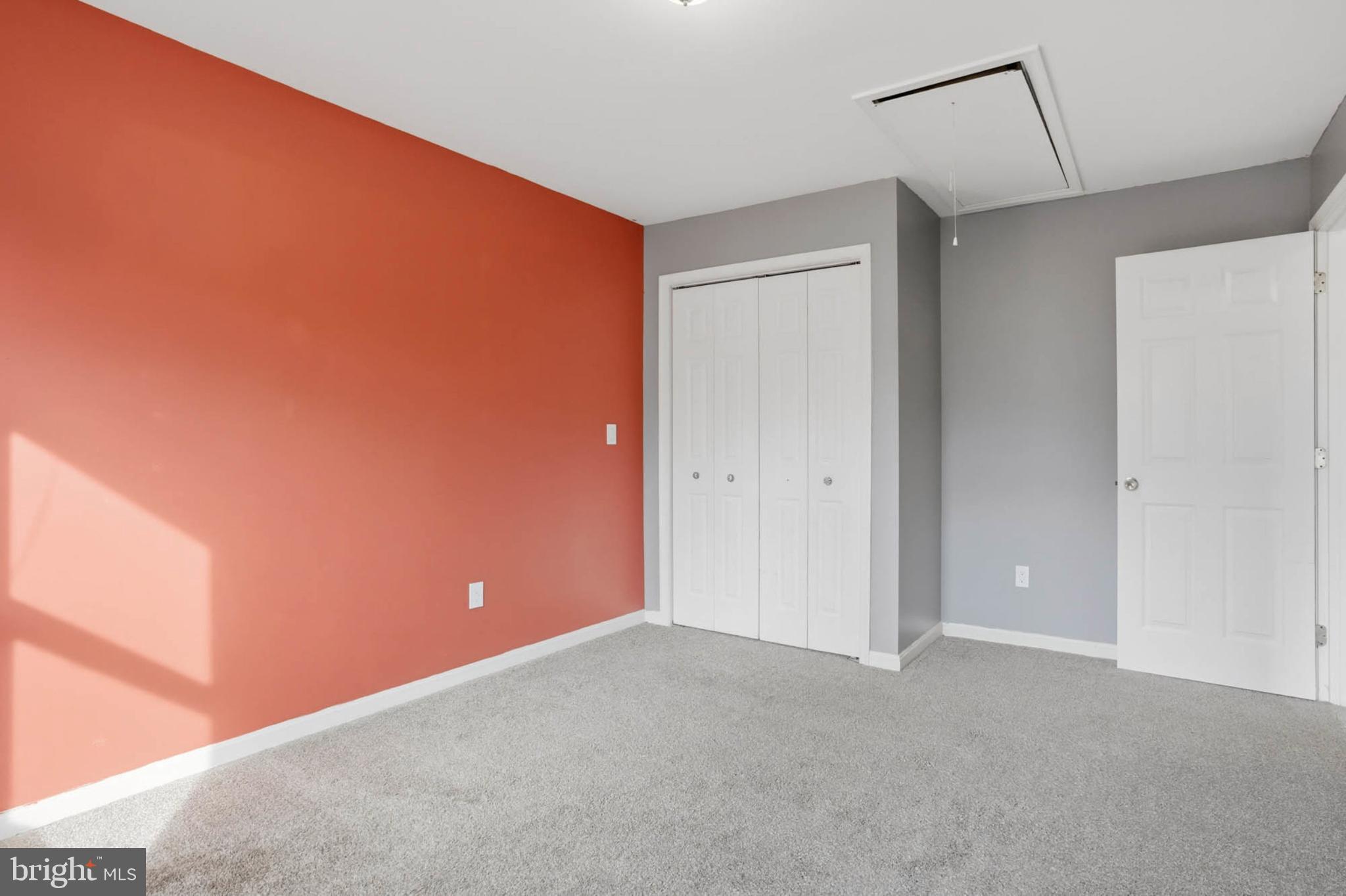 4742 Chestnut Road Shady Side, MD 20764 - Photo 22 of 41 Vibrant hues enhance this cozy bedroom space.
