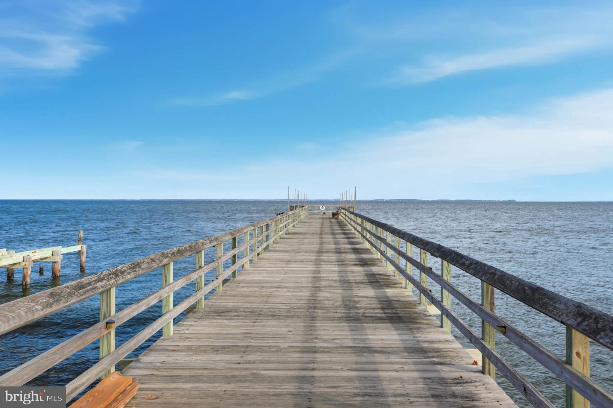 4742 Chestnut Road Shady Side, MD 20764 - Photo 31 of 41 Serene pier stretching into tranquil waters.