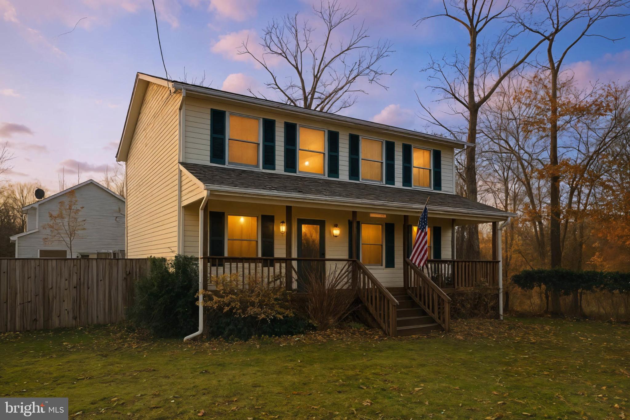 4742 Chestnut Road Shady Side, MD 20764 - Photo 39 of 41 Charming home with inviting porch at dusk.