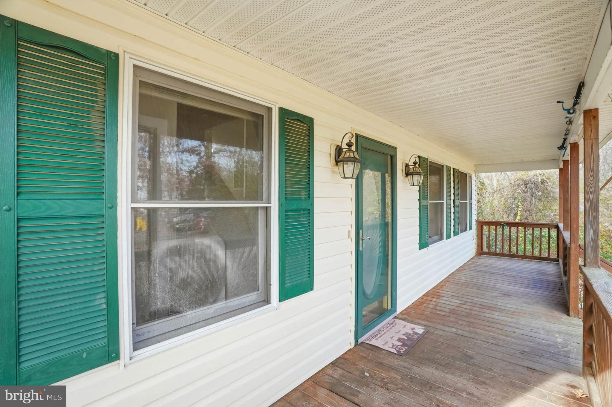 4742 Chestnut Road Shady Side, MD 20764 - Photo 4 of 41 Charming porch with inviting green shutters.