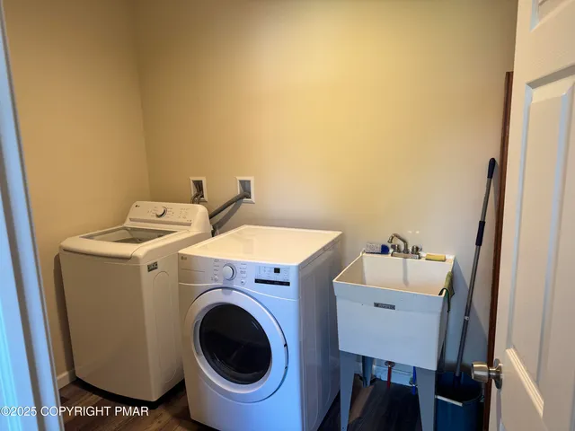 a utility room with dryer and washer
