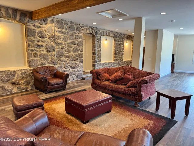 a living room with furniture and a couch