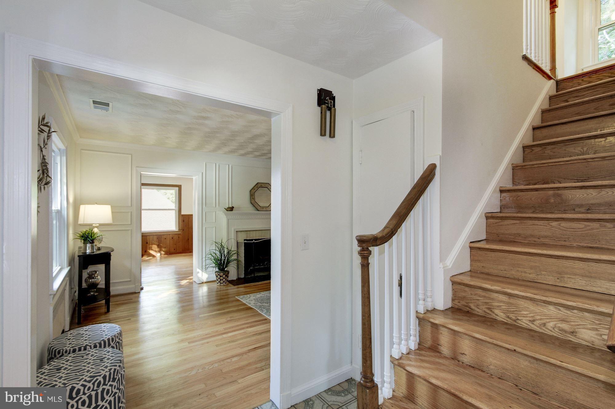 102 Wayne Avenue Silver Spring, MD 20901 - Photo 14 of 29 a view of entryway and hall with wooden floor