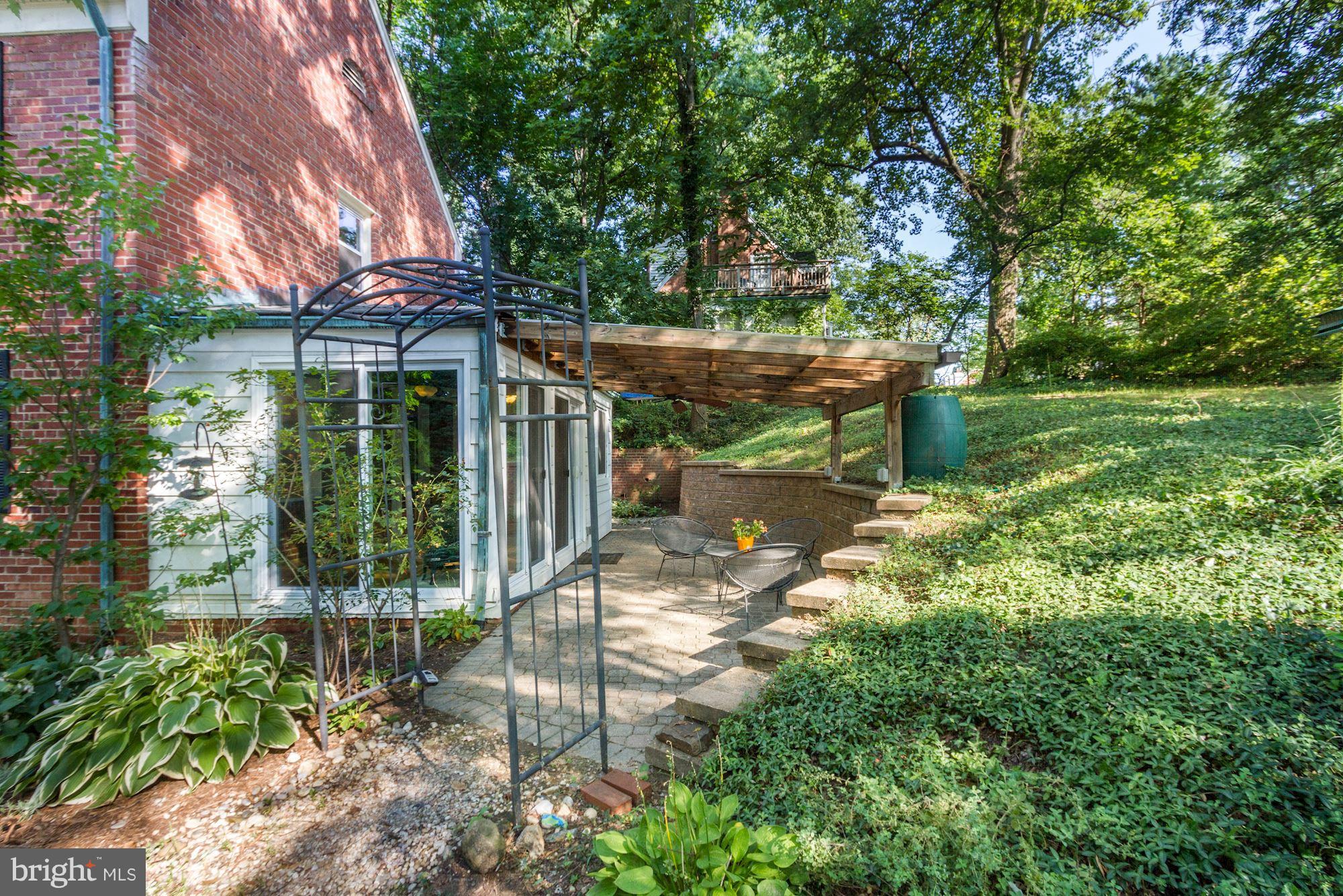 102 Wayne Avenue Silver Spring, MD 20901 - Photo 27 of 29 a view of a house with backyard and sitting area