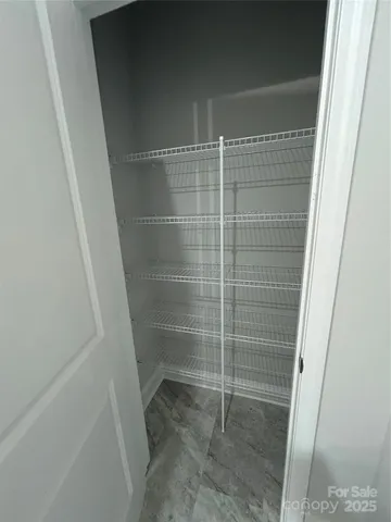 a bathroom with a glass door shower