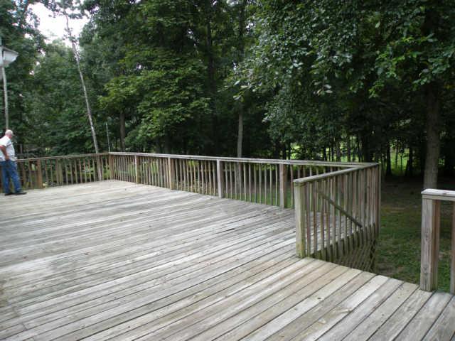 4754 Campbell Road Cross Plains, TN 37049 - Photo 14 of 20 a balcony with trees in front of it