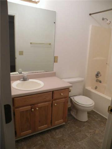 4754 Campbell Road Cross Plains, TN 37049 - Photo 16 of 20 a bathroom with a sink toilet and shower