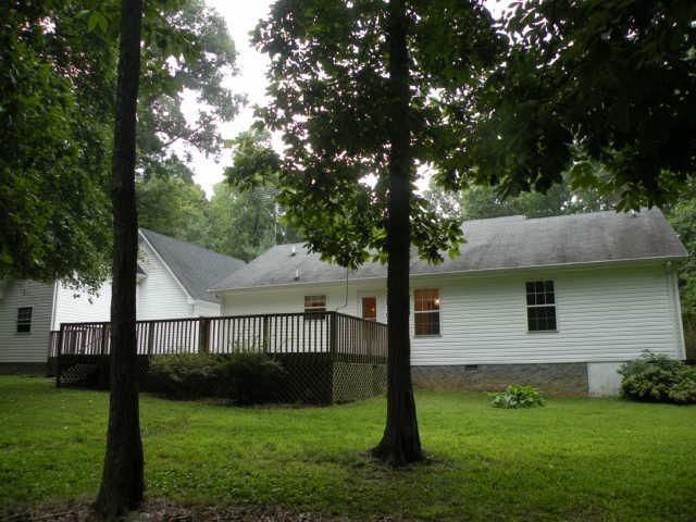 4754 Campbell Road Cross Plains, TN 37049 - Photo 20 of 20 a view of a house with a backyard
