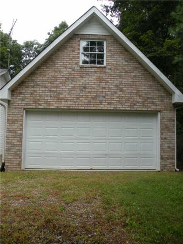 4754 Campbell Road Cross Plains, TN 37049 - Photo 3 of 20 a view of a backyard of the house
