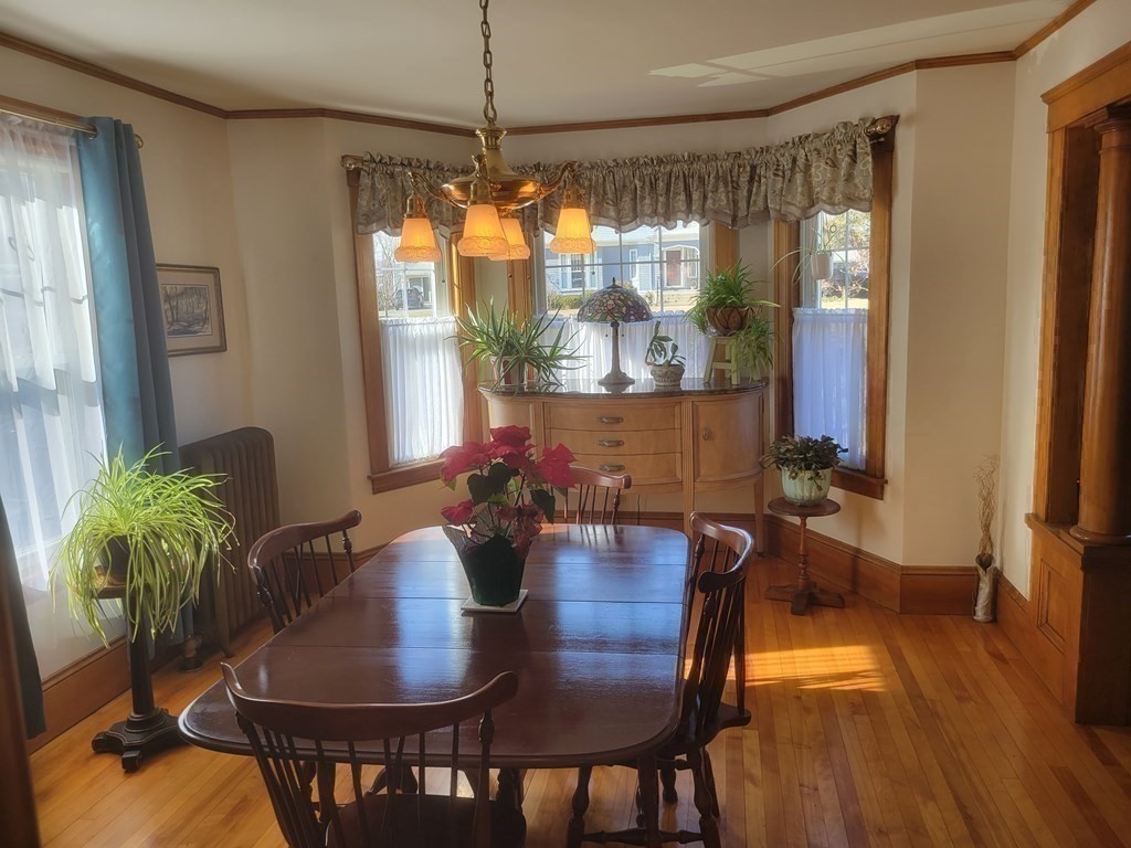 970 Pleasant Street Worcester, MA 01602 - Photo 19 of 39 a view of a dining room with furniture window and outside view