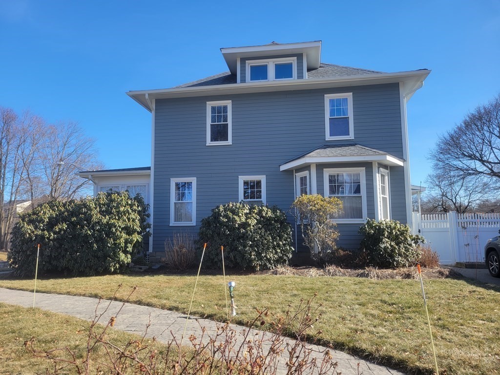 970 Pleasant Street Worcester, MA 01602 - Photo 2 of 39 a front view of a house with a yard
