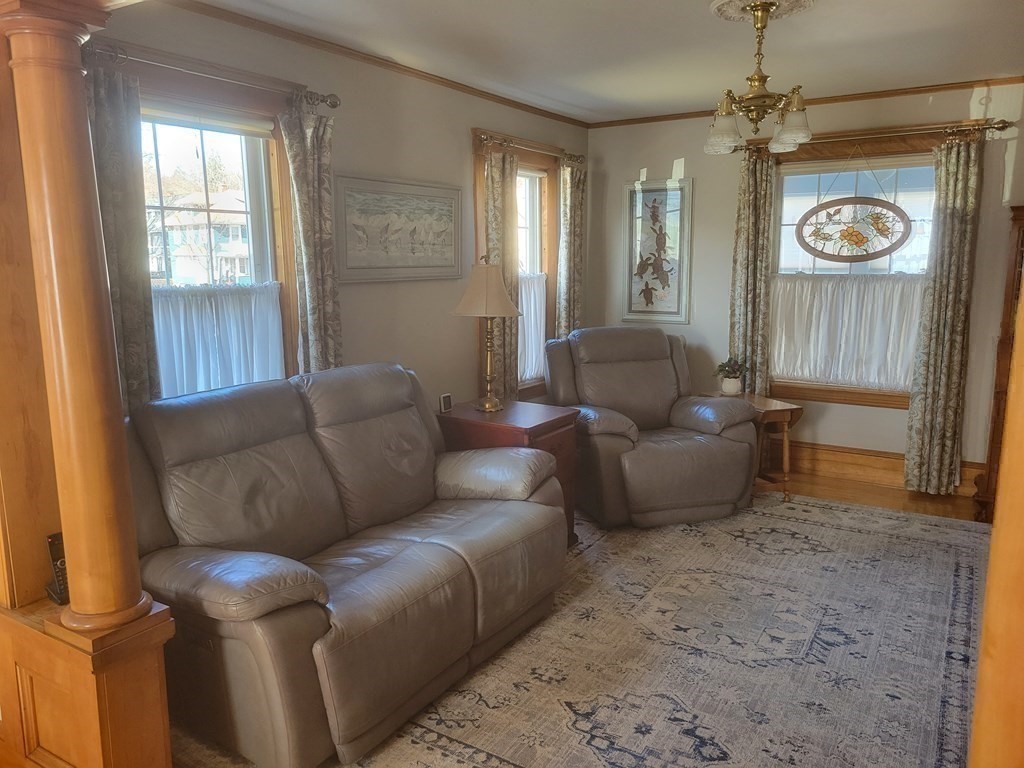 970 Pleasant Street Worcester, MA 01602 - Photo 25 of 39 a living room with furniture and a window