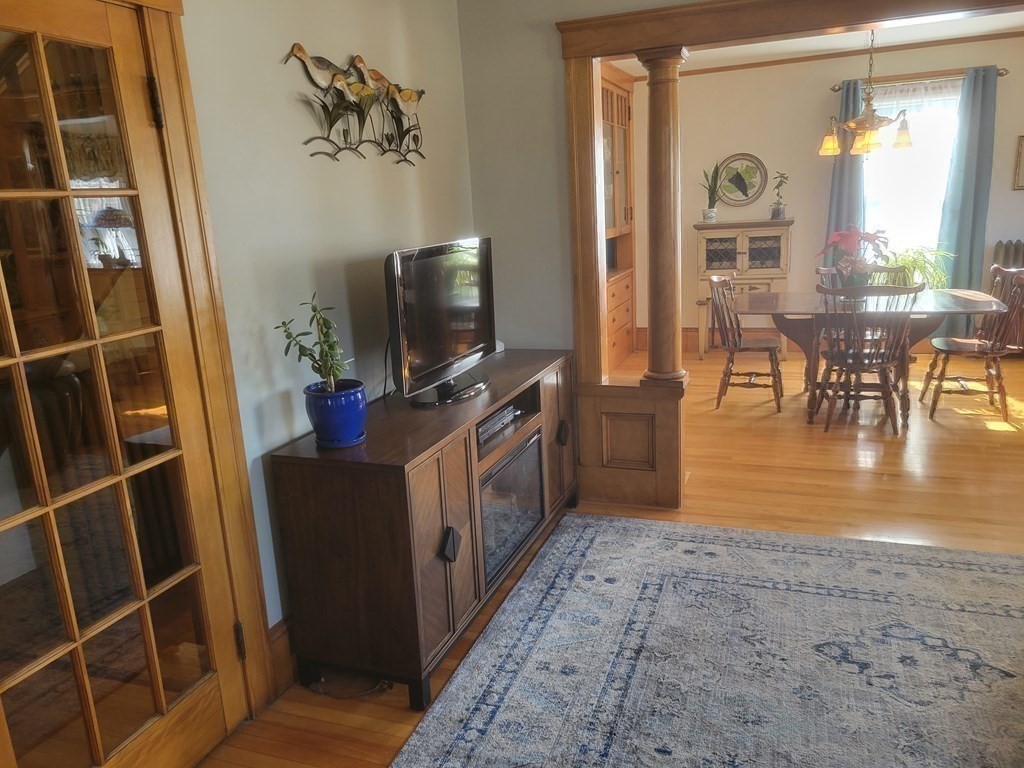 970 Pleasant Street Worcester, MA 01602 - Photo 26 of 39 a view of living room with furniture and flat screen tv