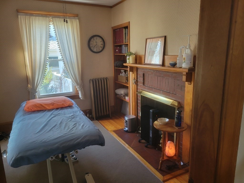 970 Pleasant Street Worcester, MA 01602 - Photo 29 of 39 a living room with furniture and a window