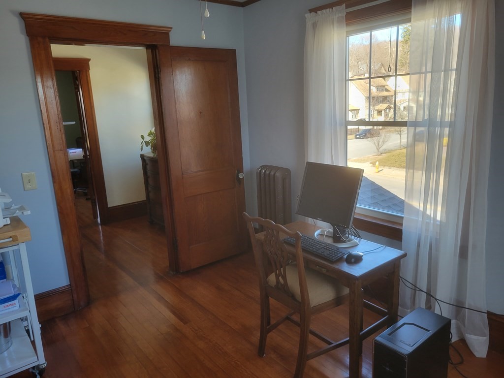970 Pleasant Street Worcester, MA 01602 - Photo 39 of 39 a view of a dining room with furniture window and wooden floor