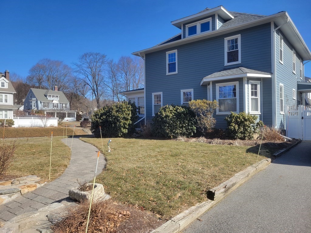 970 Pleasant Street Worcester, MA 01602 - Photo 4 of 39 a front view of a house with yard