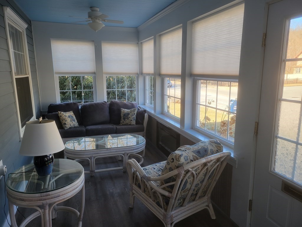 970 Pleasant Street Worcester, MA 01602 - Photo 5 of 39 a living room with furniture and a window