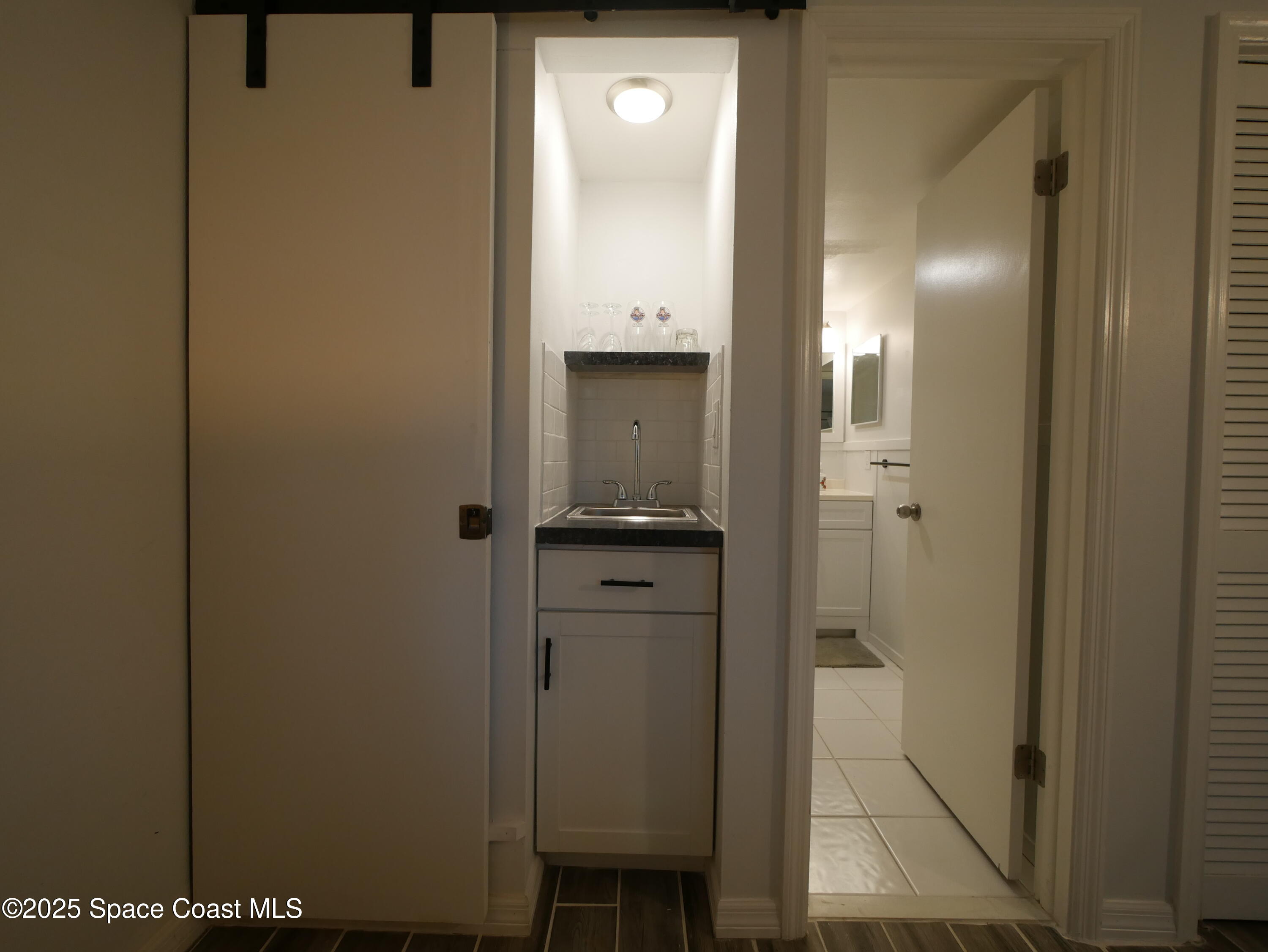 1318 South Miramar Avenue, Unit 208 Indialantic, FL 32903 - Photo 15 of 20 a view of a bathroom