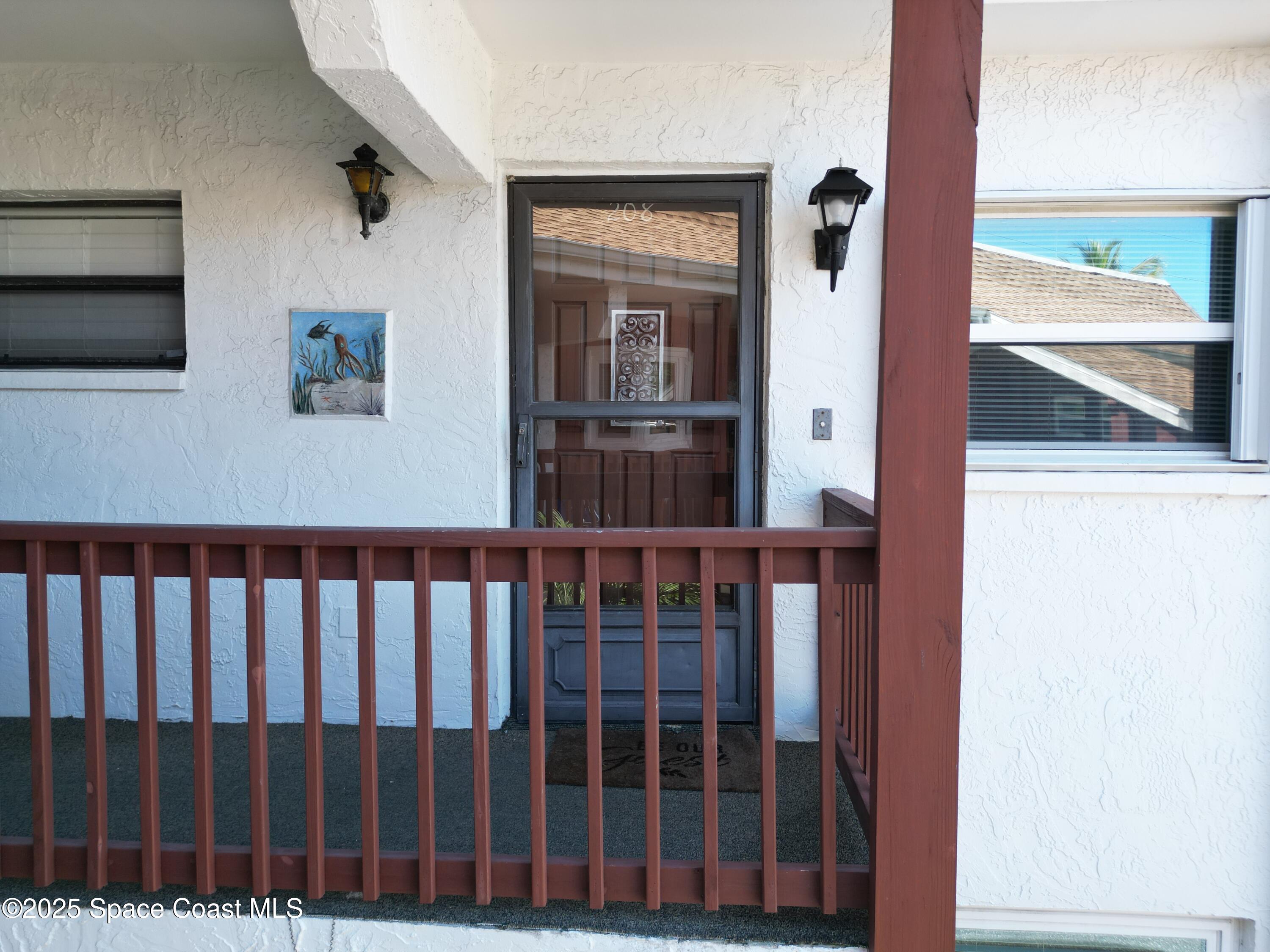 1318 South Miramar Avenue, Unit 208 Indialantic, FL 32903 - Photo 7 of 20 a view of a balcony