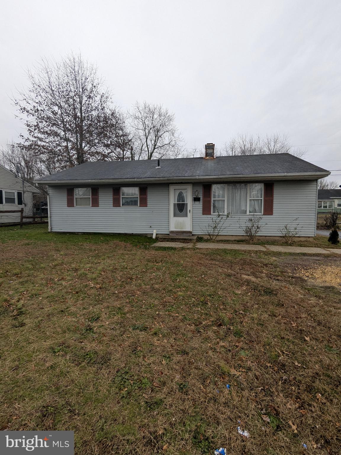 1502 3rd Avenue Bridgeton, NJ 08302 - Photo 1 of 15 a front view of a house with a yard