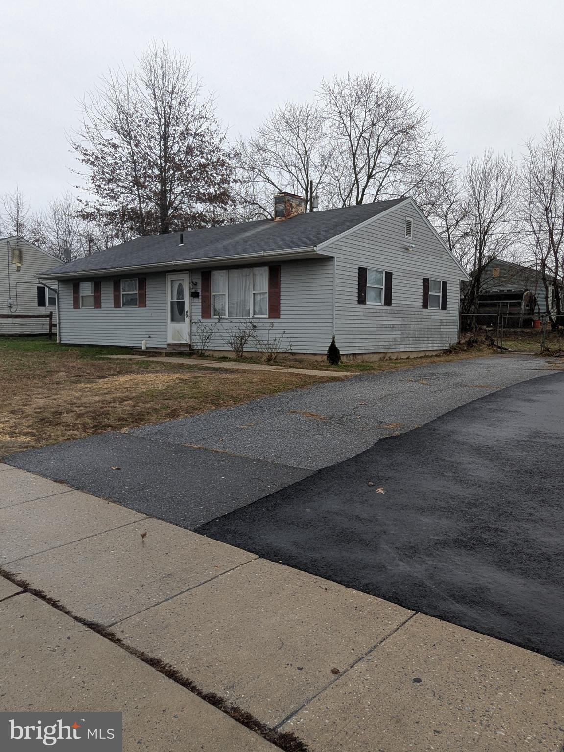 1502 3rd Avenue Bridgeton, NJ 08302 - Photo 15 of 15 a front view of a house with a yard