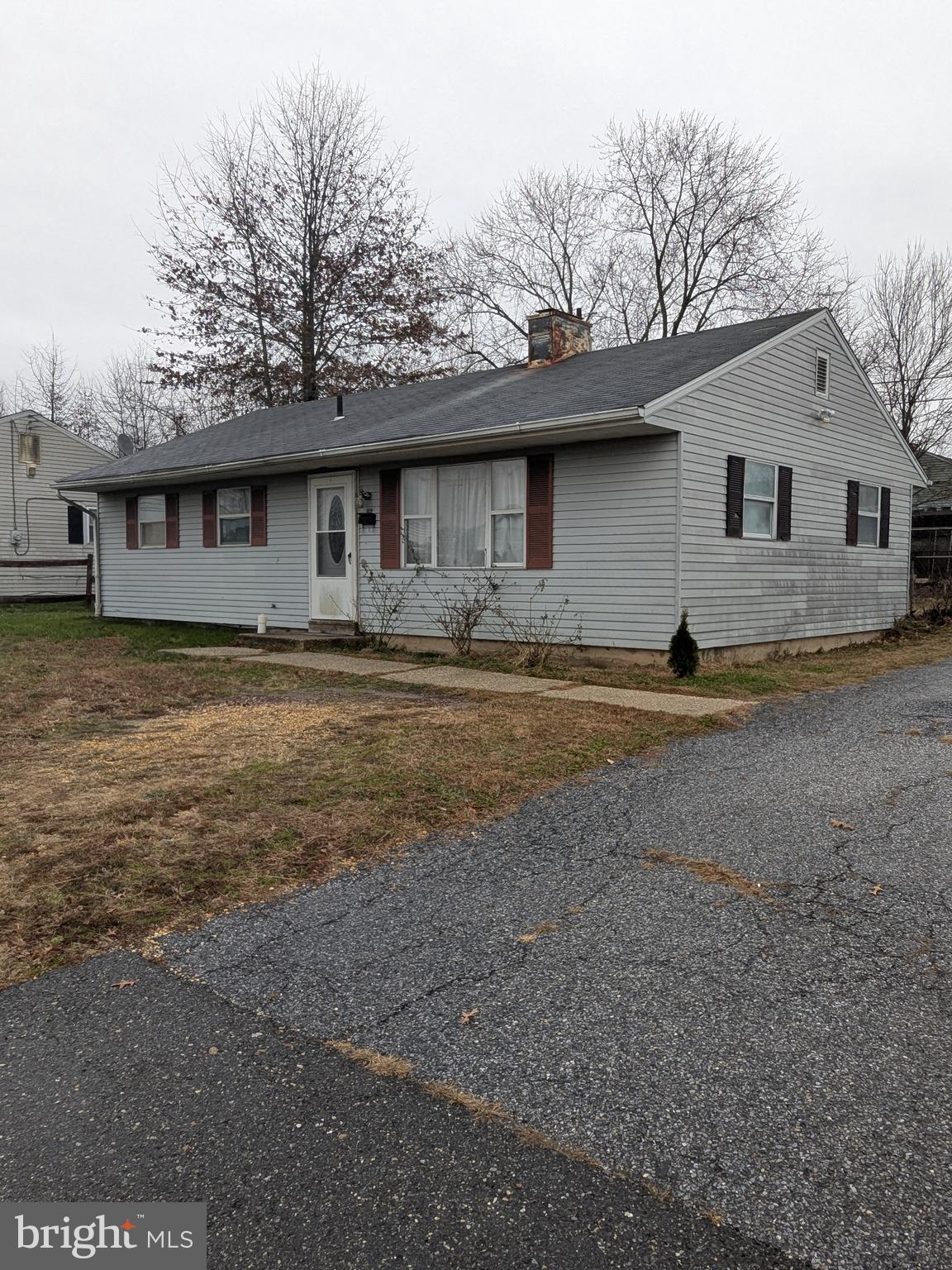 1502 3rd Avenue Bridgeton, NJ 08302 - Photo 2 of 15 a house that has a tree in front of it
