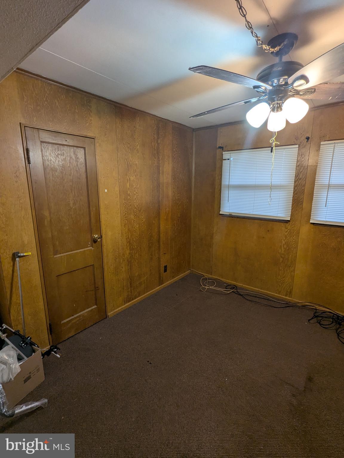 1502 3rd Avenue Bridgeton, NJ 08302 - Photo 7 of 15 an empty room with a mirror