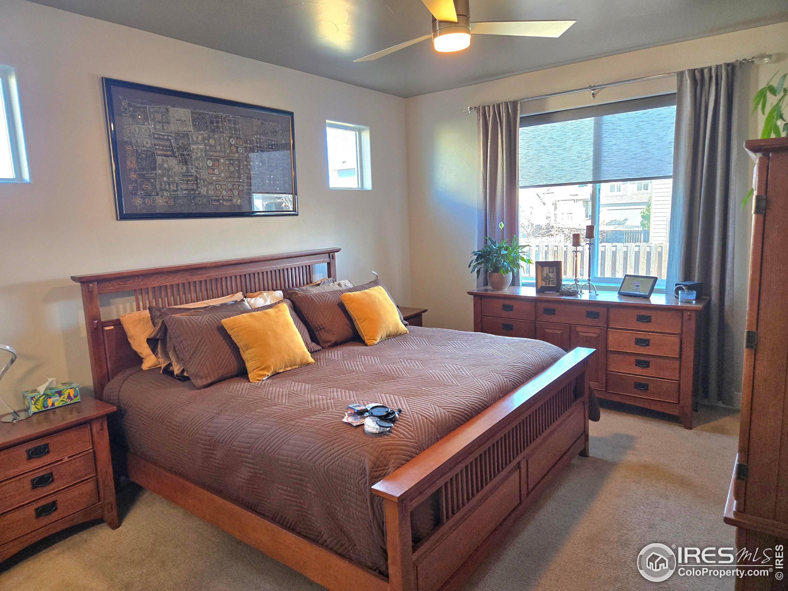 7292 McClellan Road Wellington, CO 80549 - Photo 12 of 19 a bed room with a bed and a window