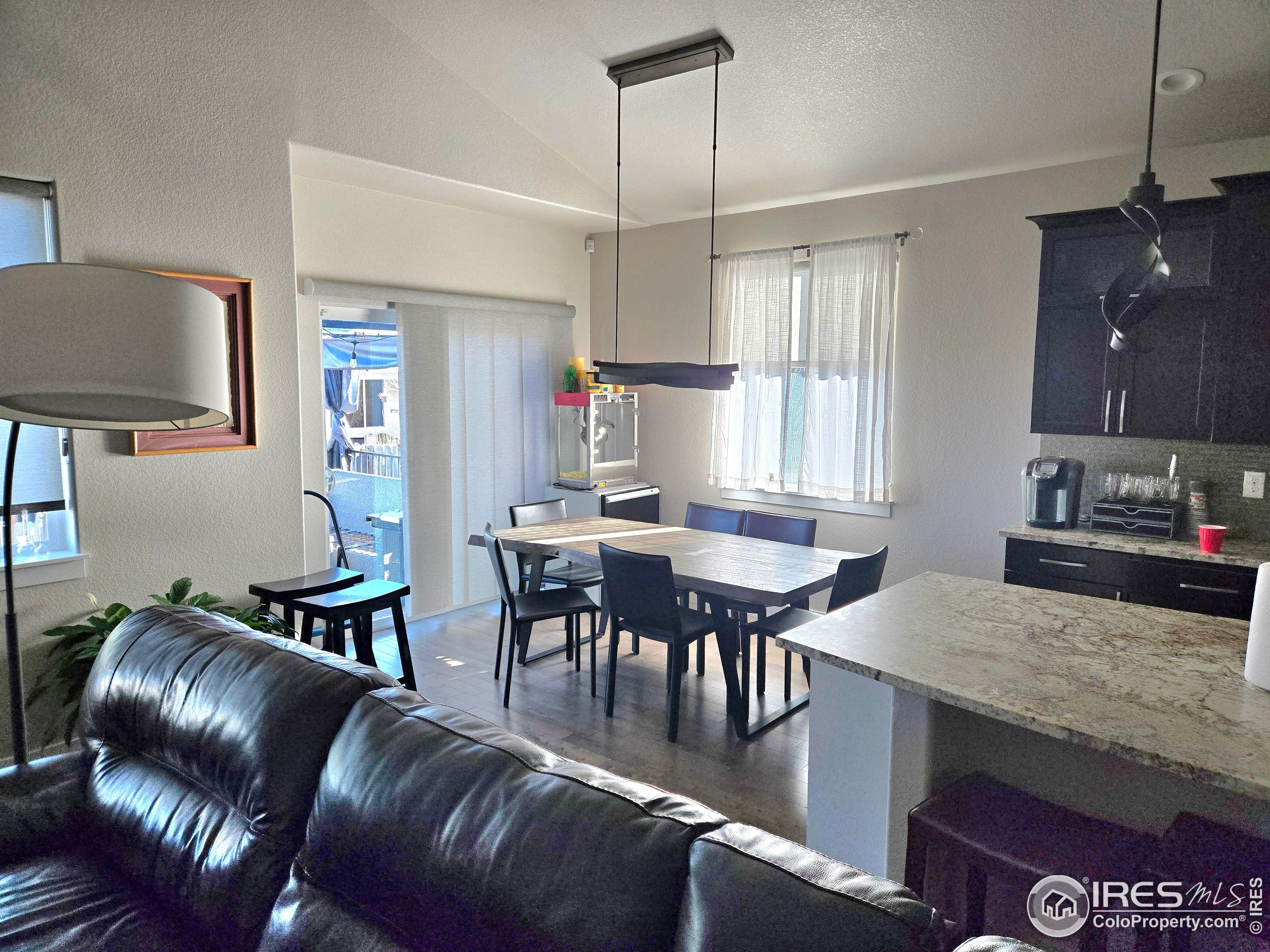 7292 McClellan Road Wellington, CO 80549 - Photo 18 of 19 a view of a dining room with furniture