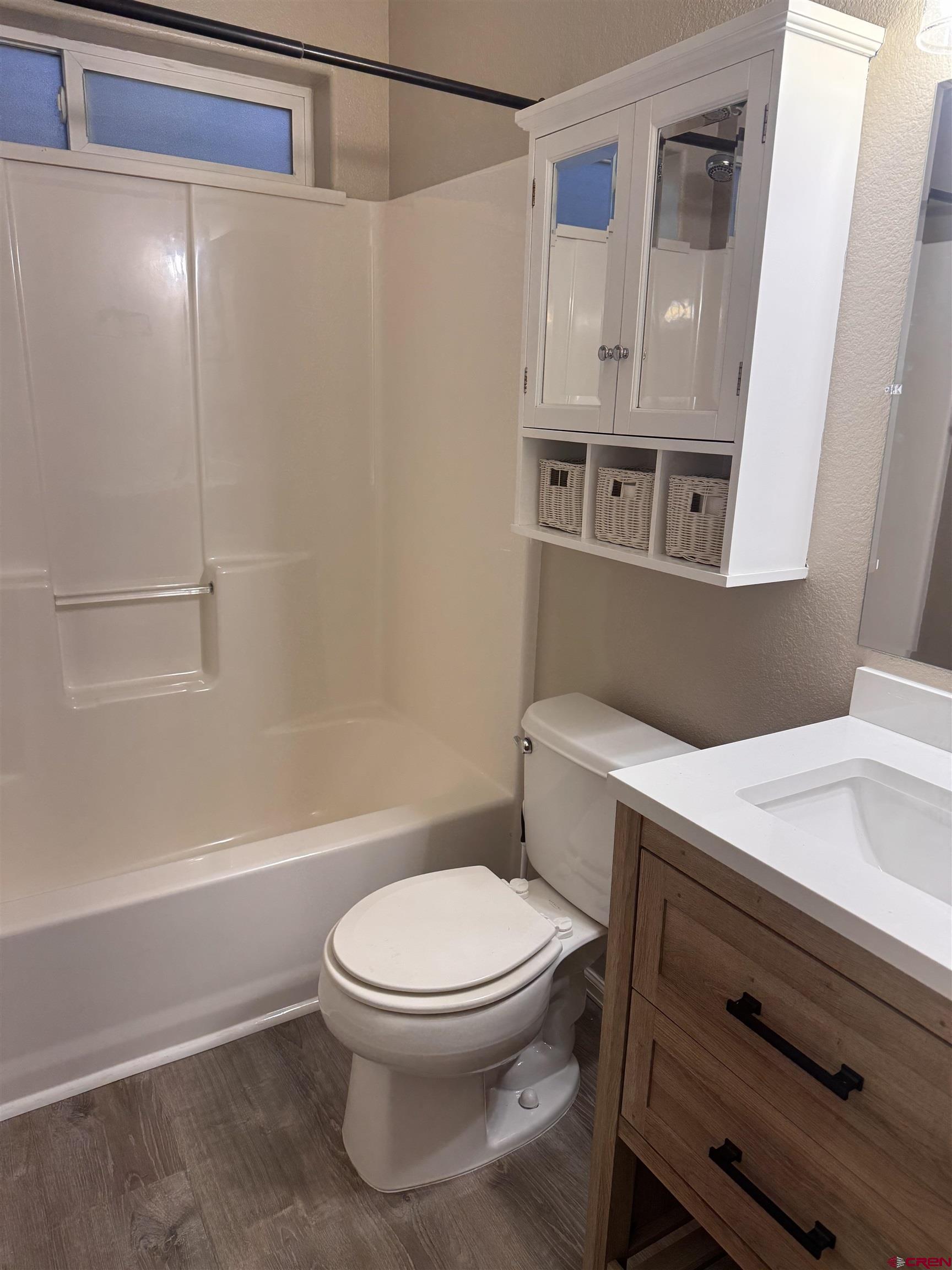 1984 Sapphire Way Delta, CO 81416 - Photo 20 of 22 a bathroom with a toilet and a shower