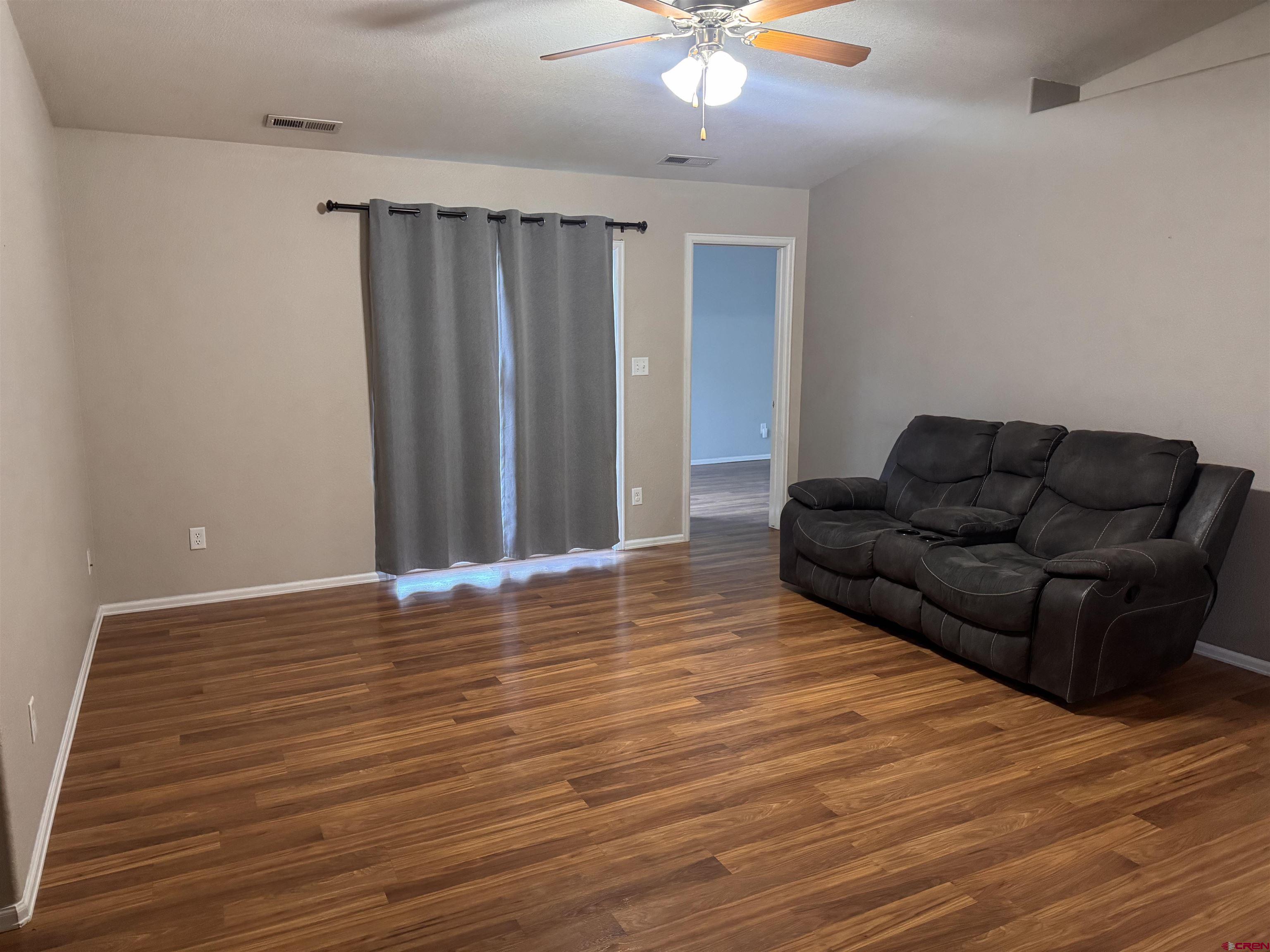 1984 Sapphire Way Delta, CO 81416 - Photo 9 of 22 a view of livingroom with furniture and wooden floor
