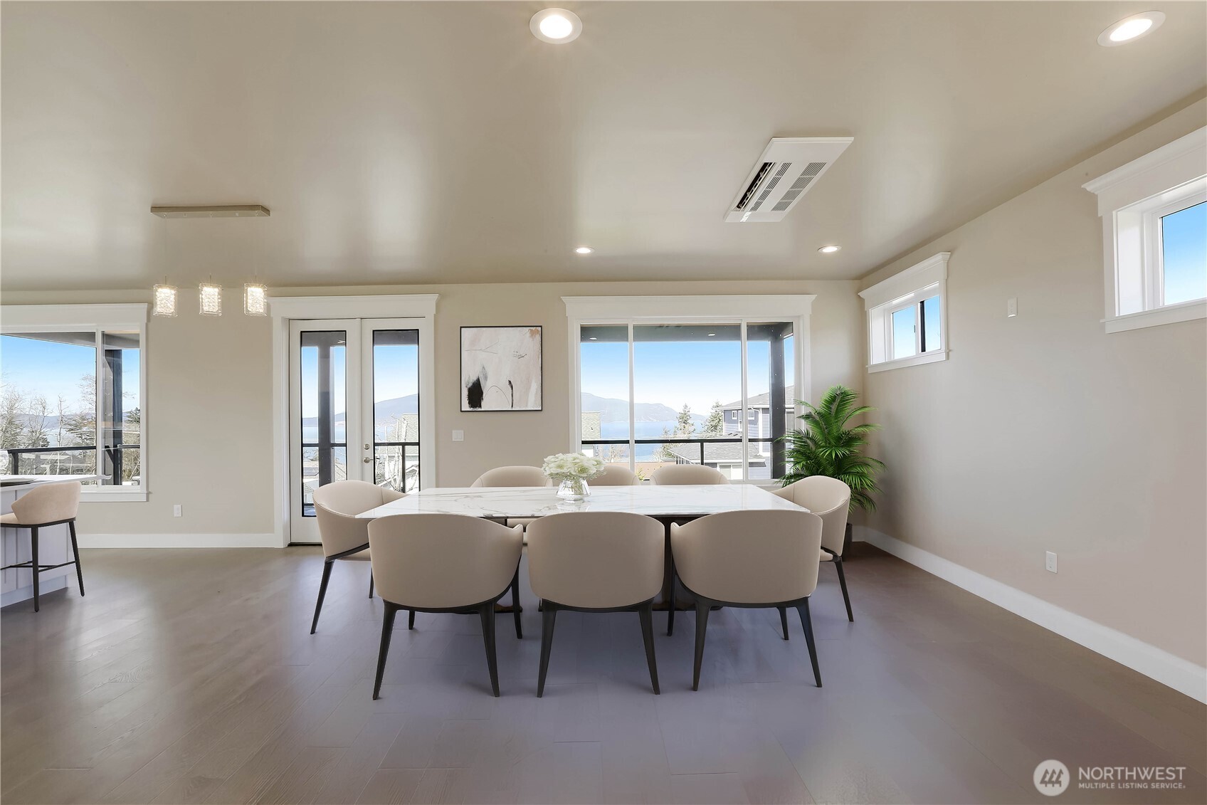 3706 West 3rd Street Anacortes, WA 98221 - Photo 17 of 40 a view of a dining room with furniture and wooden floor