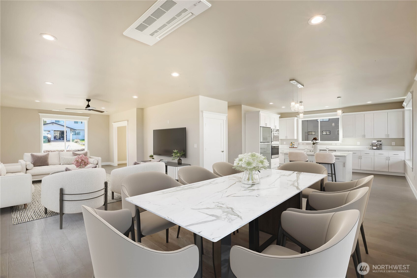 3706 West 3rd Street Anacortes, WA 98221 - Photo 18 of 40 a living room with furniture a rug and white walls
