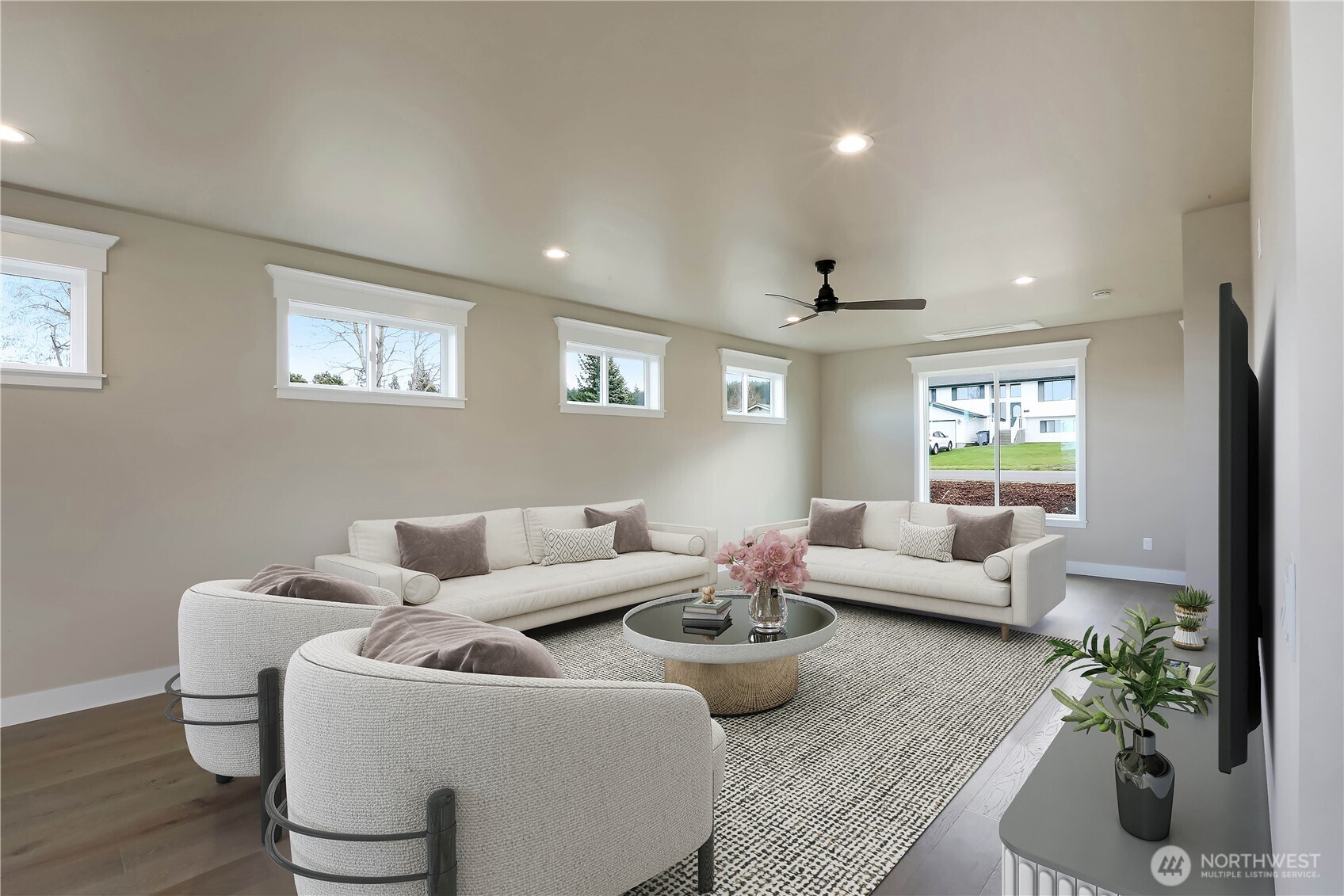 3706 West 3rd Street Anacortes, WA 98221 - Photo 19 of 40 a living room with furniture and a large window