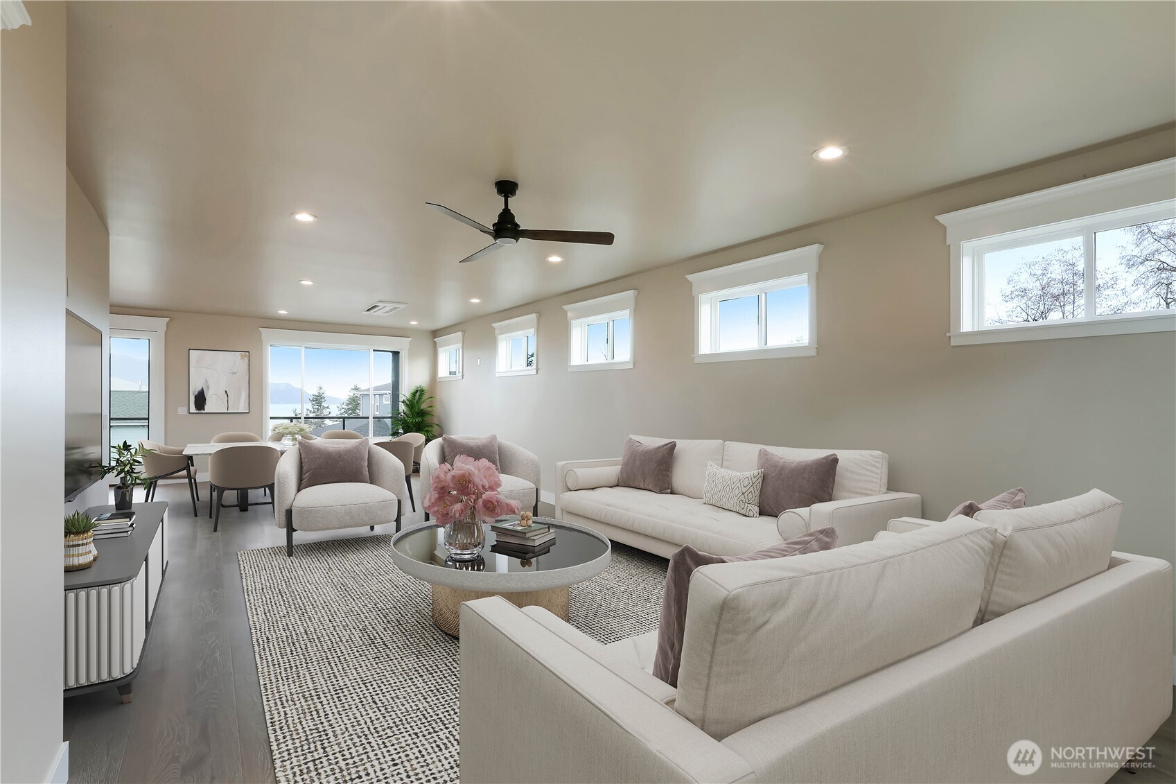 3706 West 3rd Street Anacortes, WA 98221 - Photo 21 of 40 a living room with furniture and a large window