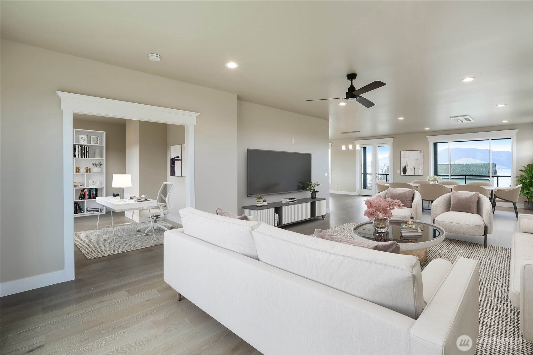 3706 West 3rd Street Anacortes, WA 98221 - Photo 22 of 40 a living room with furniture and a flat screen tv