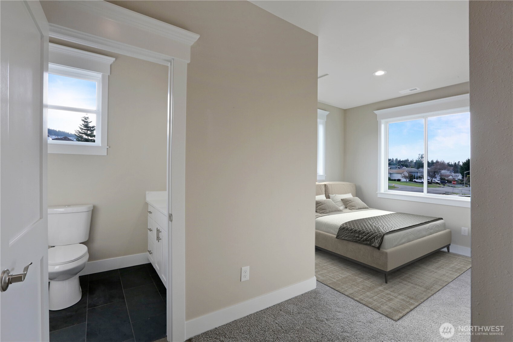 3706 West 3rd Street Anacortes, WA 98221 - Photo 26 of 40 a living room with a couch and a table