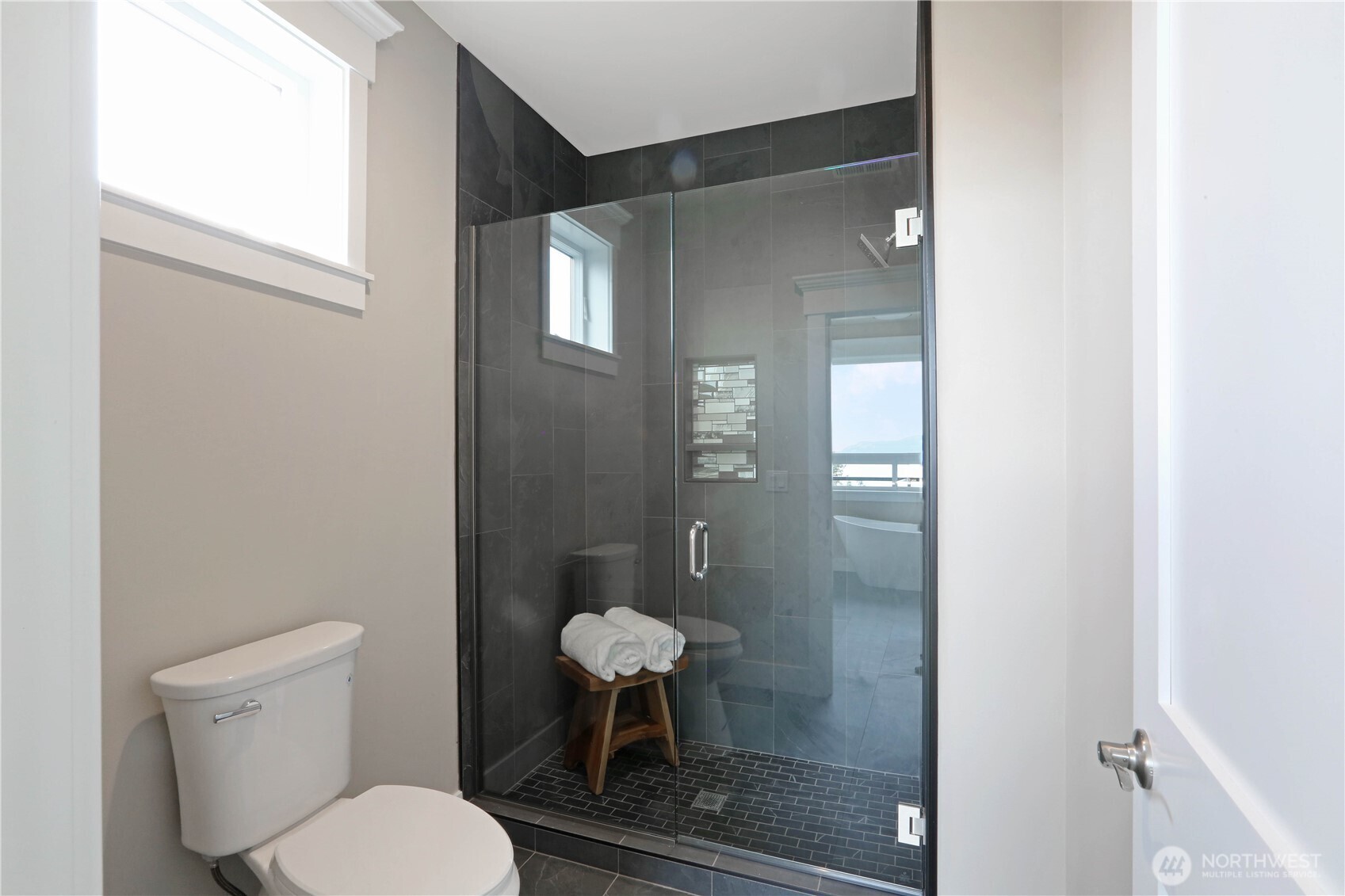 3706 West 3rd Street Anacortes, WA 98221 - Photo 38 of 40 a bathroom with a toilet and a shower