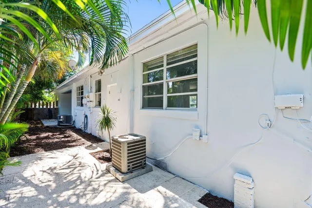a view of a backyard with plants