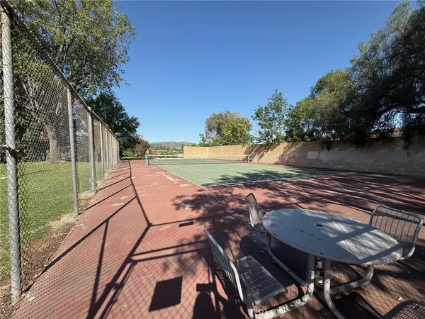 a view of a backyard of the house