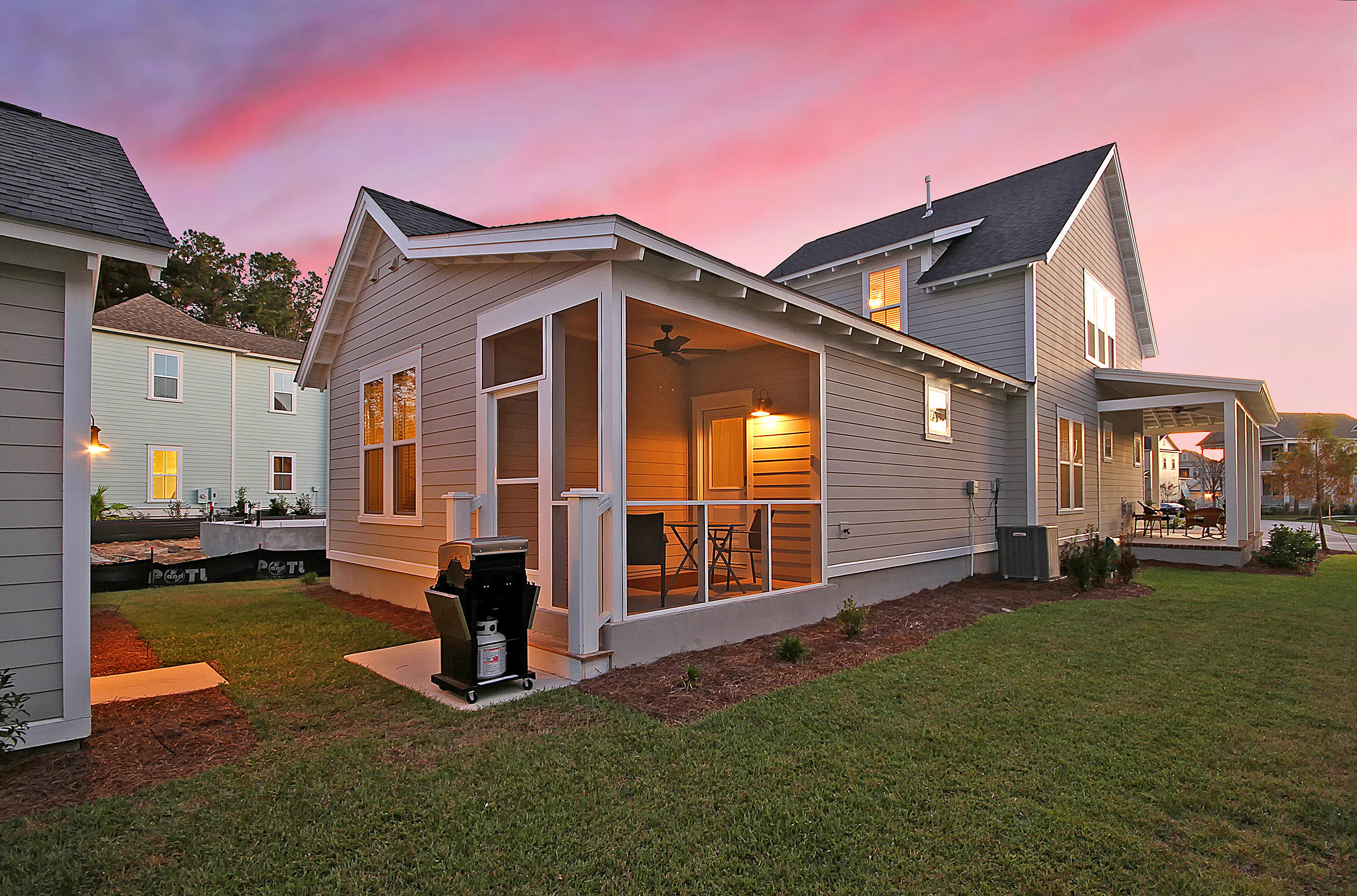 1564 Cranes Nest Road Mount Pleasant, SC 29466 - Photo 33 of 38 Screened Porch and Yard at Twilight