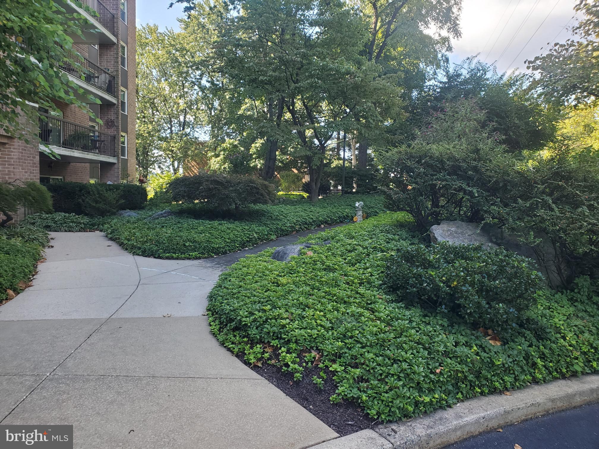 1375 Pershing Boulevard, Unit 810 Reading, PA 19607 - Photo 2 of 21 a view of a garden with plants and trees