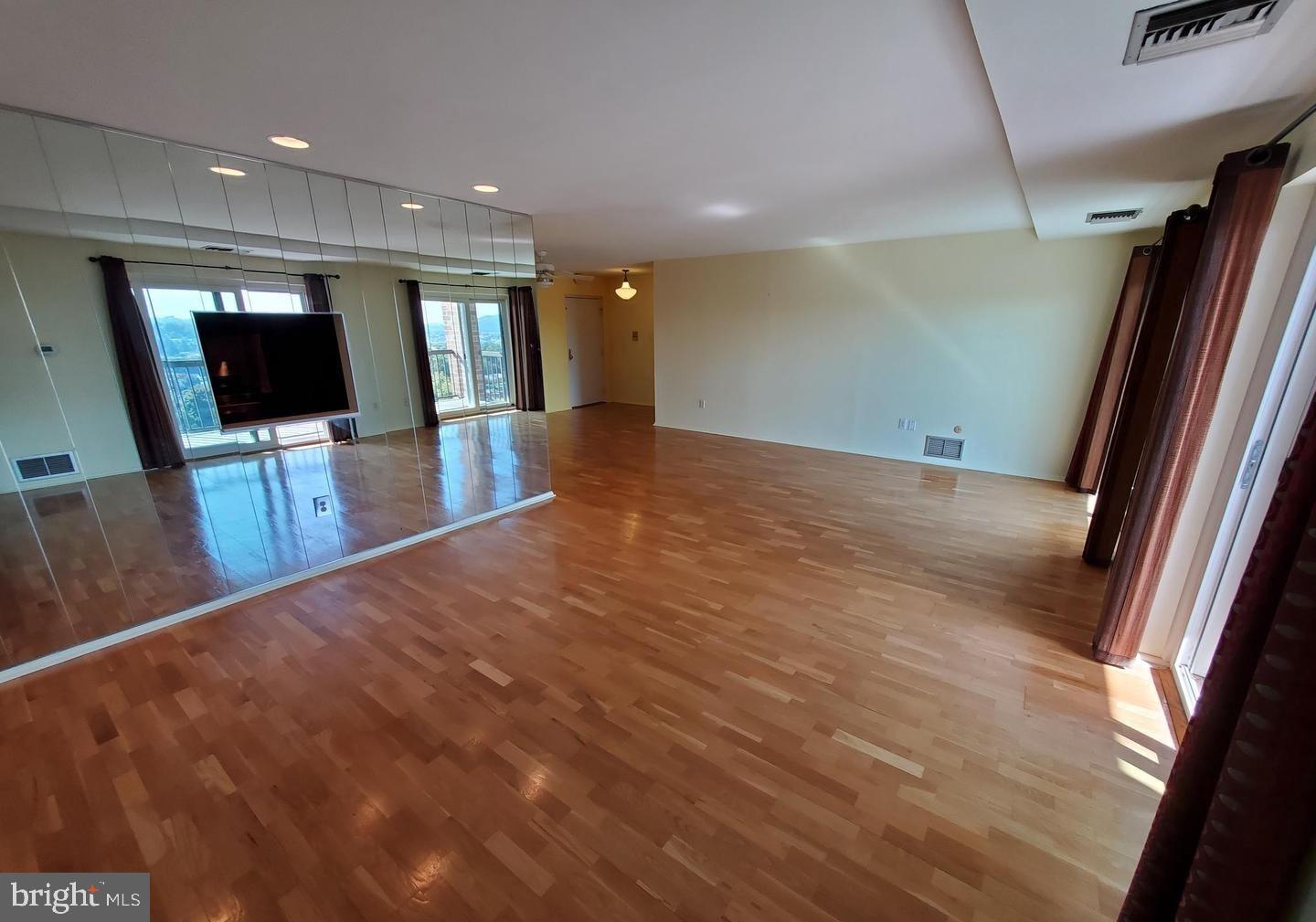 1375 Pershing Boulevard, Unit 810 Reading, PA 19607 - Photo 7 of 21 a view of a living room with a flat screen tv