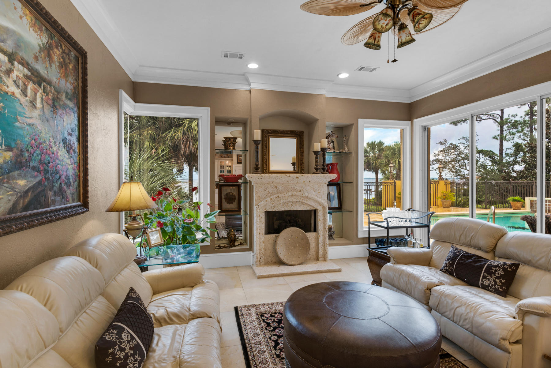 1239 Driftwood Point Road Santa Rosa Beach, FL 32459 - Photo 18 of 66 a living room with furniture fireplace and a large window