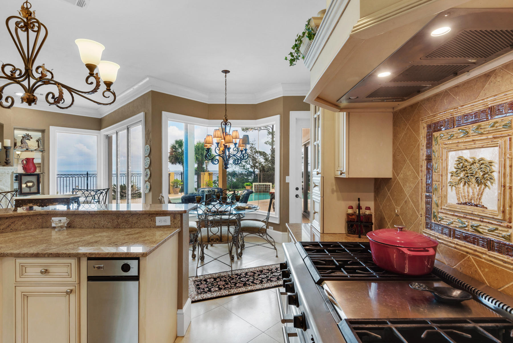 1239 Driftwood Point Road Santa Rosa Beach, FL 32459 - Photo 22 of 66 a kitchen with a stove a sink and a refrigerator