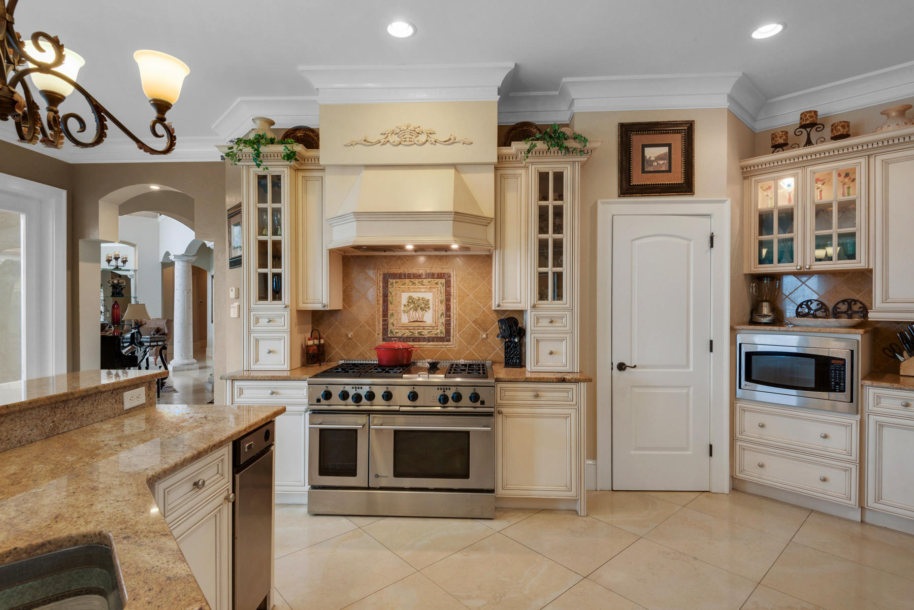 1239 Driftwood Point Road Santa Rosa Beach, FL 32459 - Photo 23 of 66 a kitchen with stainless steel appliances granite countertop a stove and a refrigerator