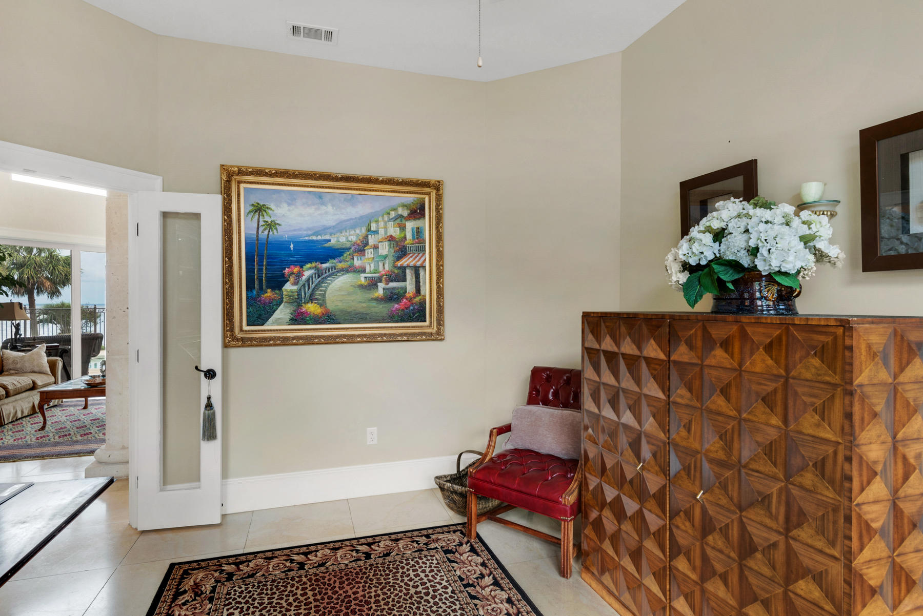 1239 Driftwood Point Road Santa Rosa Beach, FL 32459 - Photo 33 of 66 a living room with furniture and flowers