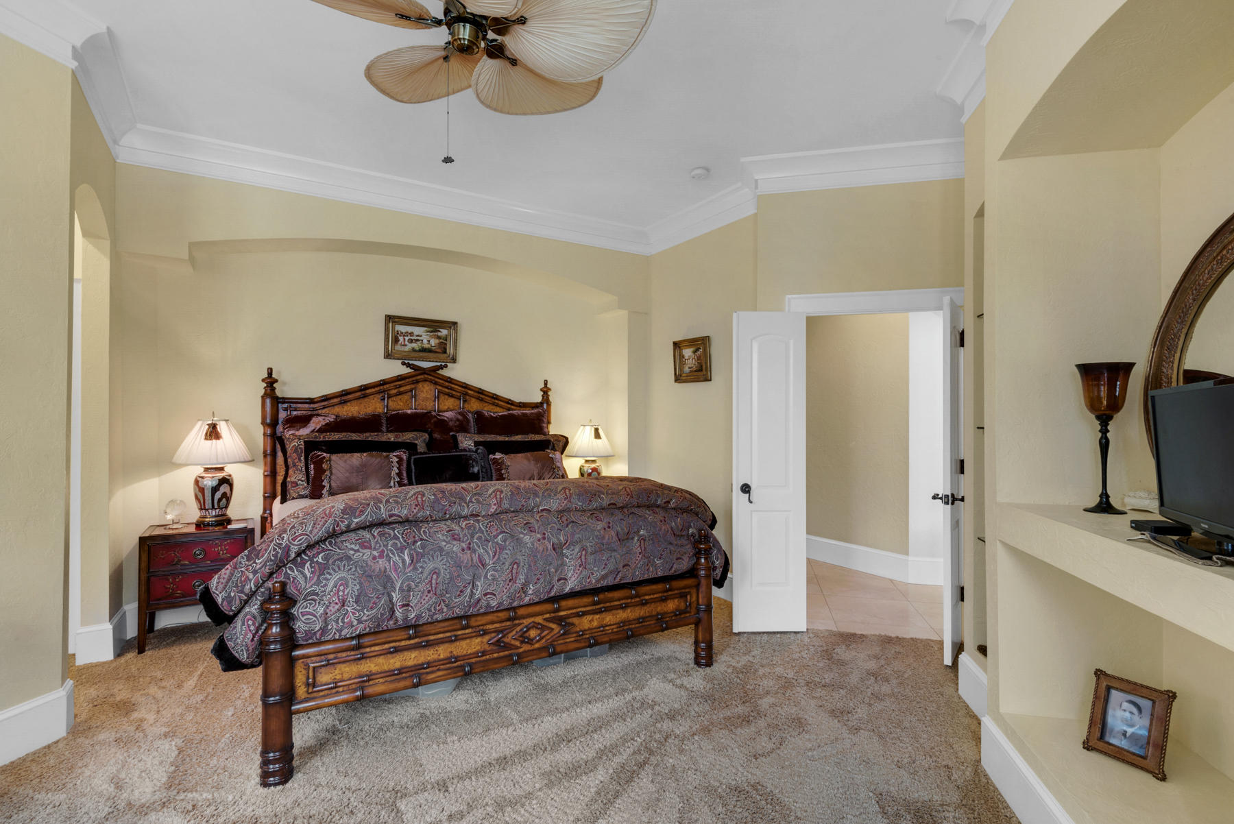 1239 Driftwood Point Road Santa Rosa Beach, FL 32459 - Photo 36 of 66 a bedroom with a bed and a flat tv screen on a dresser