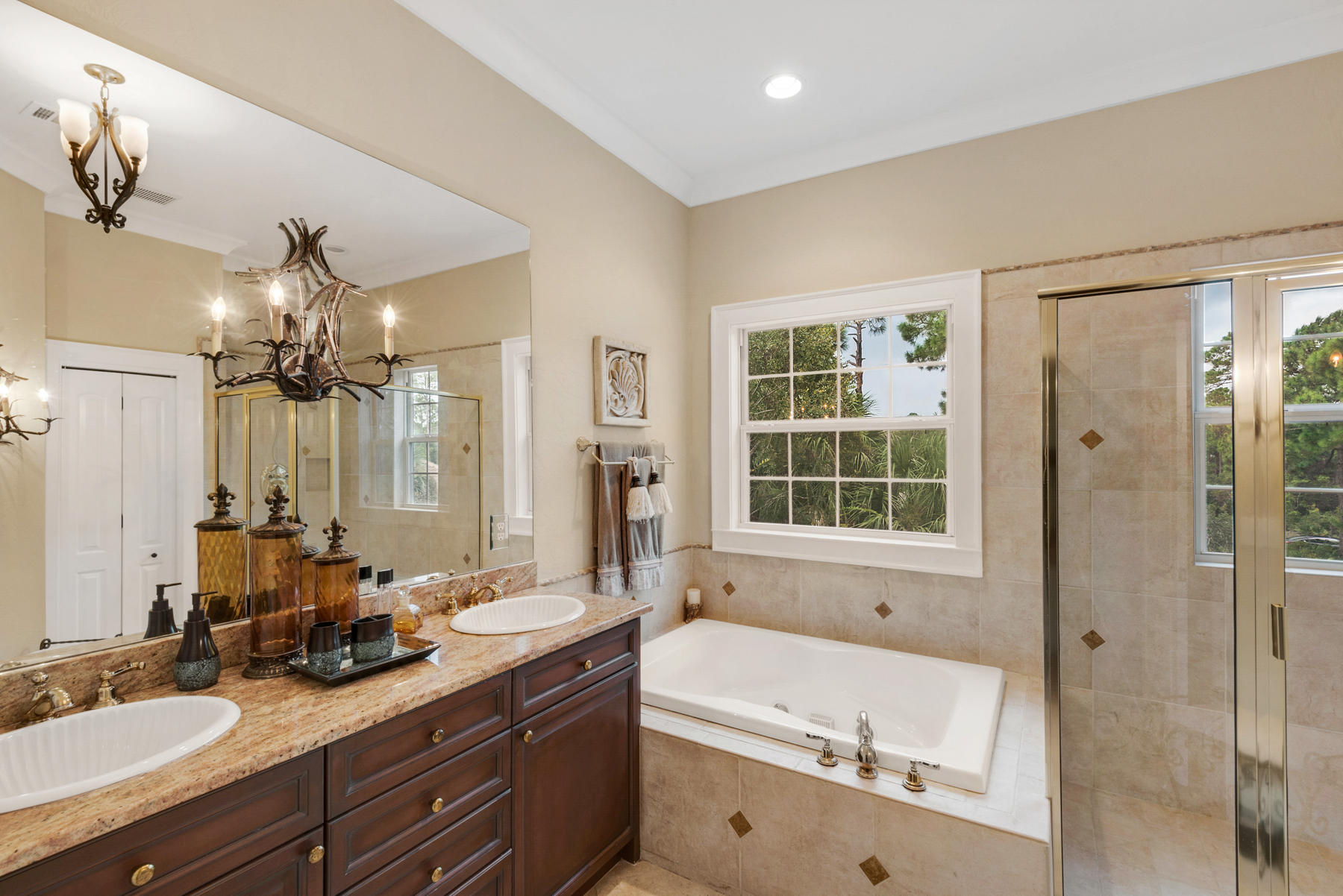 1239 Driftwood Point Road Santa Rosa Beach, FL 32459 - Photo 59 of 66 a bathroom with a tub sink double vanity granite and shower