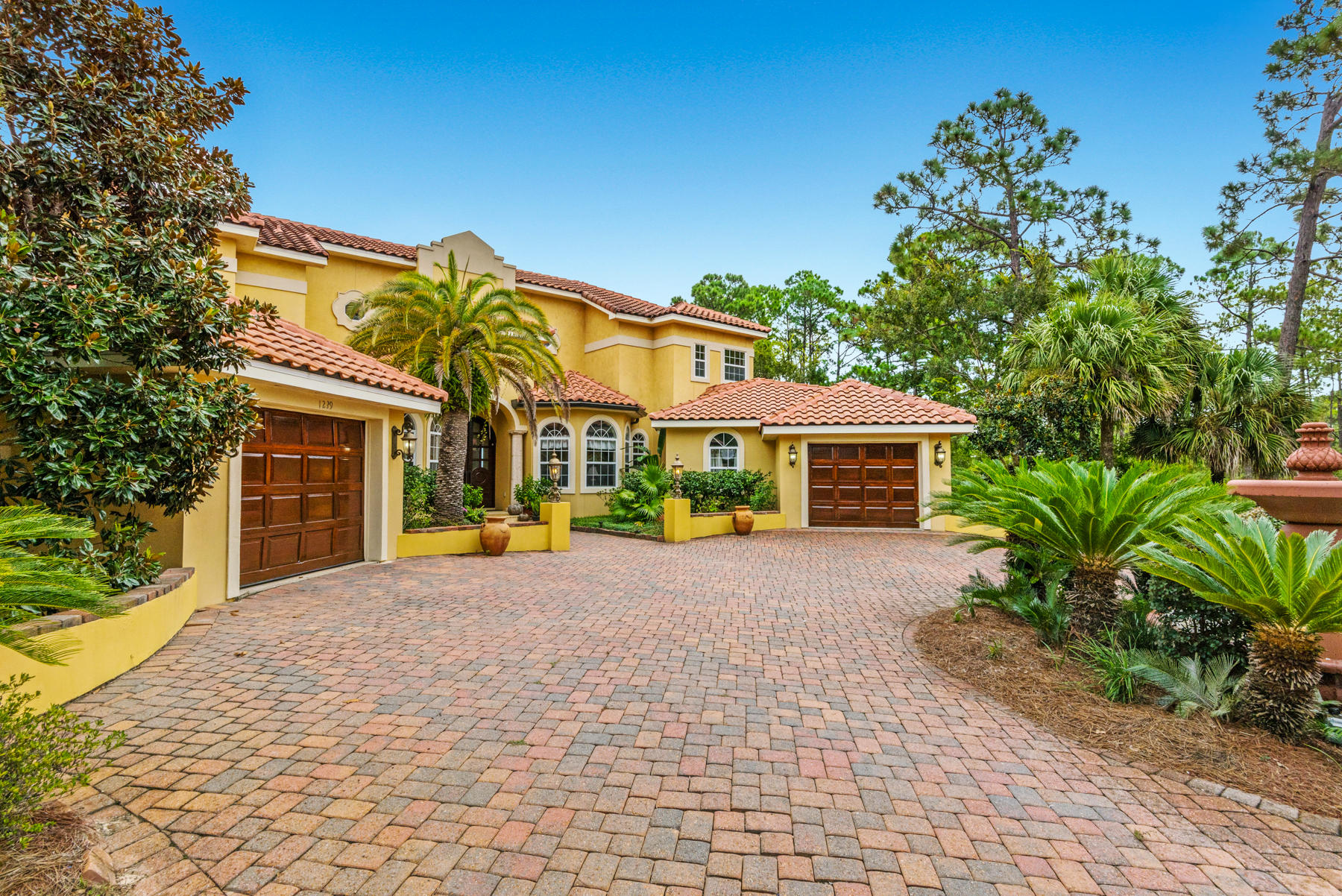 1239 Driftwood Point Road Santa Rosa Beach, FL 32459 - Photo 63 of 66 a view of a house with a patio